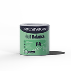 Canister of Natural VetCare Gut Balance on a green background