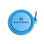 Blue silicone dog bowl with 'Natural VetCare' logo on a white background